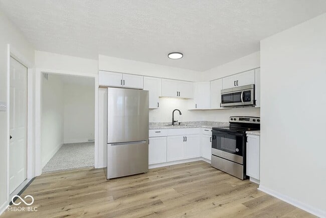 7737 Southfield Dr in Southport, IN - Building Photo - Building Photo