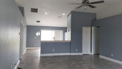 5141 Pine Needle Dr in Mascotte, FL - Building Photo - Building Photo