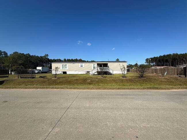 239 Road 5027 Rd in Cleveland, TX - Building Photo - Building Photo