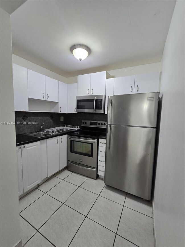 property at 8320 NW 8th St