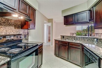 124 Cypress Way E in Naples, FL - Building Photo - Building Photo