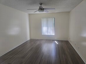 1455 SW Silver Pine Way, Unit 106D2 in Palm City, FL - Building Photo - Building Photo