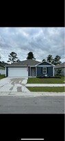 5934 Goldeneye Dr in Winnabow, NC - Building Photo