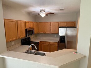 10101 Poppy Hill Dr in Ft. Myers, FL - Building Photo - Building Photo