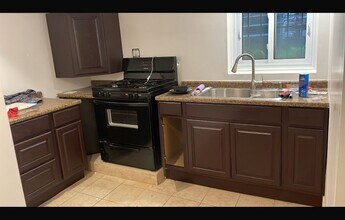 4324 W Parker Ave, Unit Garden unit in Chicago, IL - Building Photo - Building Photo