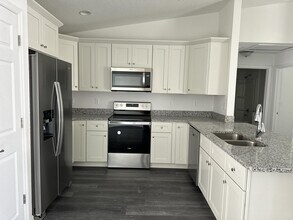 7 Malauka Pass Dr in Ocklawaha, FL - Building Photo - Building Photo