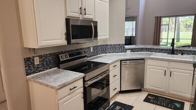 7028 Torrey Pines Cir in Port St. Lucie, FL - Building Photo - Building Photo