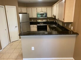 1655 The Greens Way, Unit 2221 in Jacksonville Beach, FL - Building Photo