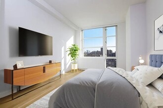 331 E Houston St in New York, NY - Building Photo - Building Photo