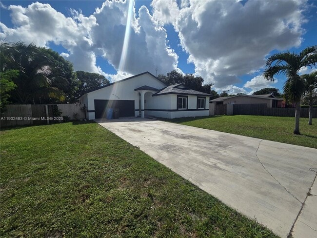 property at 4490 SW 19th St