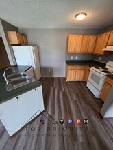 410 13th Ave NW in Oelwein, IA - Building Photo - Building Photo