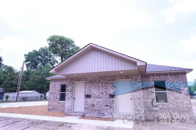 304 Olive St in Trumann, AR - Foto de edificio - Building Photo