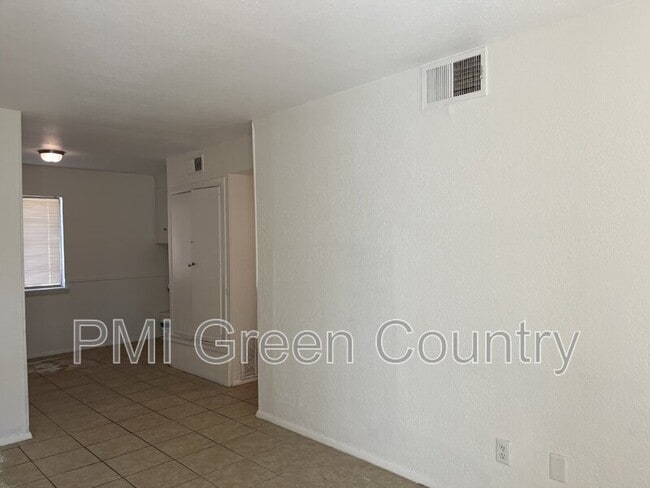 property at 1412 S 73rd E Ave