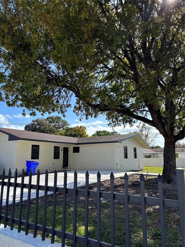 property at 5915 NW 12th Ave