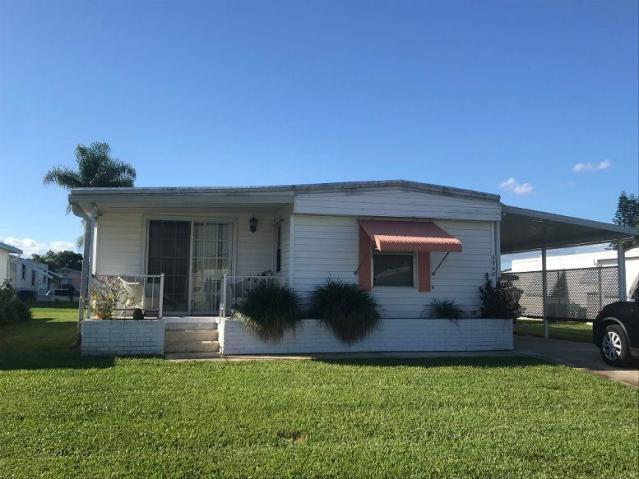 6948 SE Delegate St in Hobe Sound, FL - Building Photo