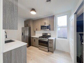 2129 N Bingham St, Unit E06P in Chicago, IL - Building Photo - Building Photo