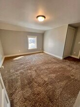 703 Main St, Unit Apartment B in Brownsville, WI - Building Photo - Building Photo