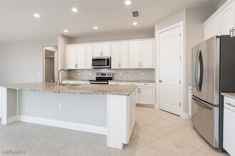 17021 Ashcomb Wy in Estero, FL - Building Photo - Building Photo