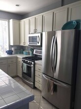 7567 Quiet Cove Cir in Huntington Beach, CA - Building Photo - Building Photo
