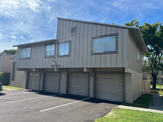 property at 5870 NW 22nd St