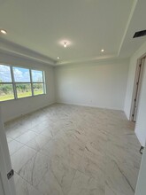 13509 SW Bally Dr in Port St. Lucie, FL - Building Photo - Building Photo