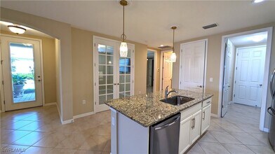 14822 Edgewater Cir in Naples, FL - Building Photo - Building Photo