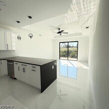 209-211 W 12th St in Lehigh Acres, FL - Building Photo - Building Photo