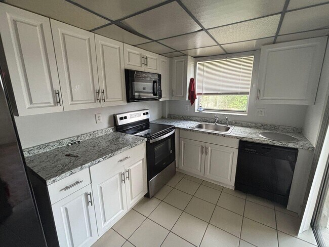 property at 10144 Boca Entrada Blvd