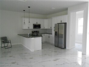 1145 Antonio St E in Lehigh Acres, FL - Building Photo - Building Photo