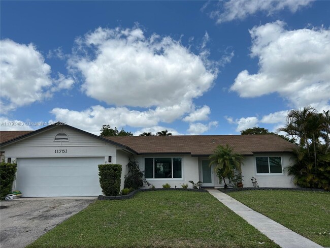 property at 11751 SW 52nd Ct