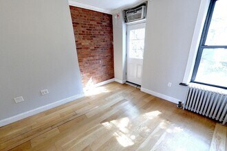 102 E 7th St in New York, NY - Building Photo - Building Photo