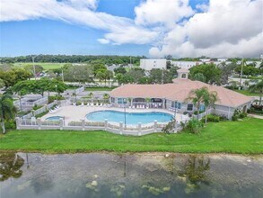 5051 Wiles Rd in Coconut Creek, FL - Building Photo - Building Photo