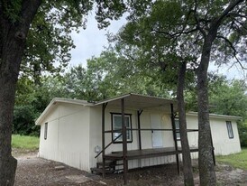 405 Hilltop Meadows Ct in Springtown, TX - Building Photo