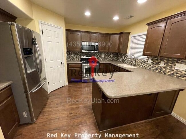 6790 Brigham Ct in Stansbury Park, UT - Building Photo - Building Photo