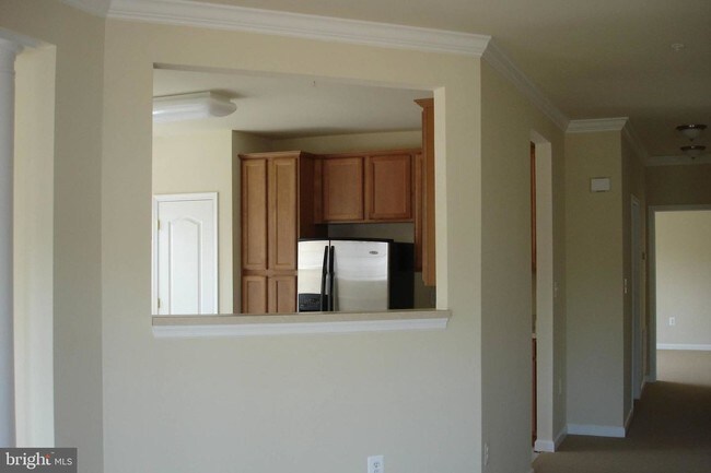 9700 Elzey Place-Unit -405 in Manassas Park, VA - Building Photo - Building Photo