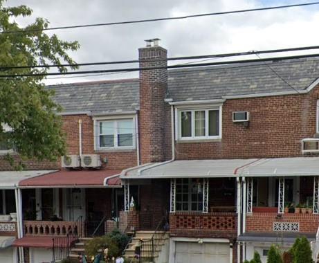 property at 58-24 80th St