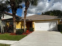 5033 Prairie Dunes Village Cir in Greenacres, FL - Building Photo - Building Photo