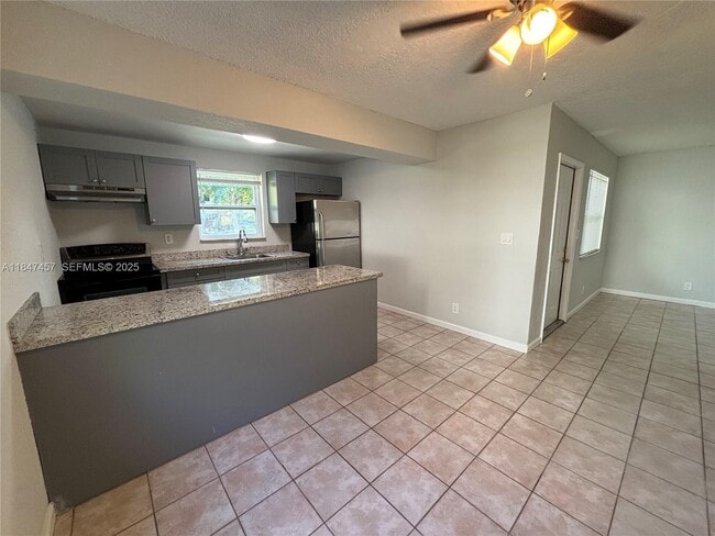 7921 NW 44th Ct in Coral Springs, FL - Building Photo - Building Photo