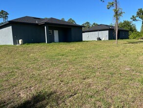 1221 Ecstasy St E in Lehigh Acres, FL - Building Photo - Building Photo