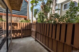 15024 Nordhoff St, Unit 12 in North Hills, CA - Building Photo - Building Photo