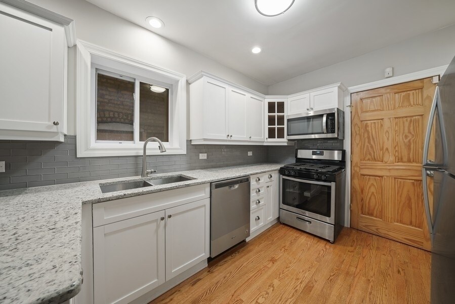 1548 N Honore St, Unit 1F in Chicago, IL - Foto de edificio