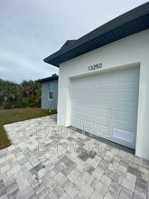 13250 Longville Ave in Port Charlotte, FL - Building Photo - Building Photo