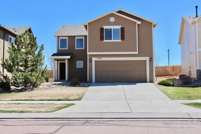 property at 7703 Manistique Dr