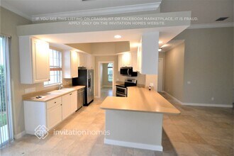 8233 Pine Cay Rd in Wellington, FL - Foto de edificio - Building Photo