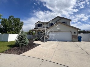 5921 Genoa Ln in Stansbury Park, UT - Building Photo - Building Photo