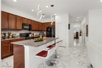 6965 Avalon Cir in Naples, FL - Foto de edificio - Building Photo