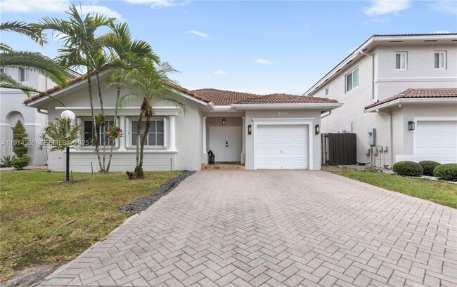 property at 13430 SW 136th Terrace