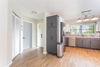 1713 Whispering Dr E in Largo, FL - Building Photo - Building Photo