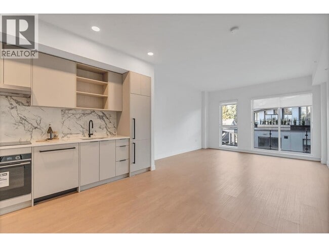 property at 422 E 3rd St