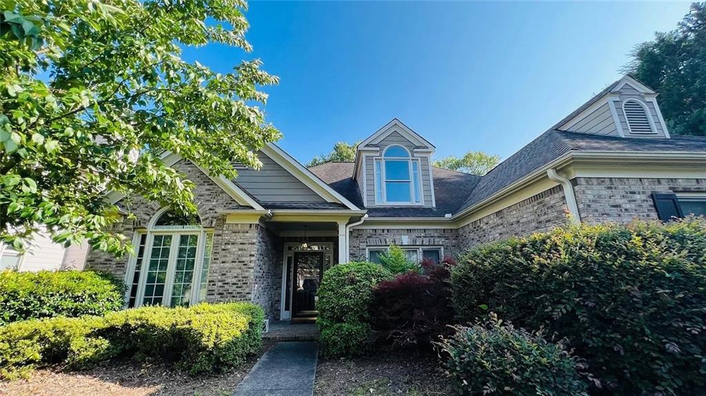 8569 Spring Breeze Terrace in Suwanee, GA - Building Photo